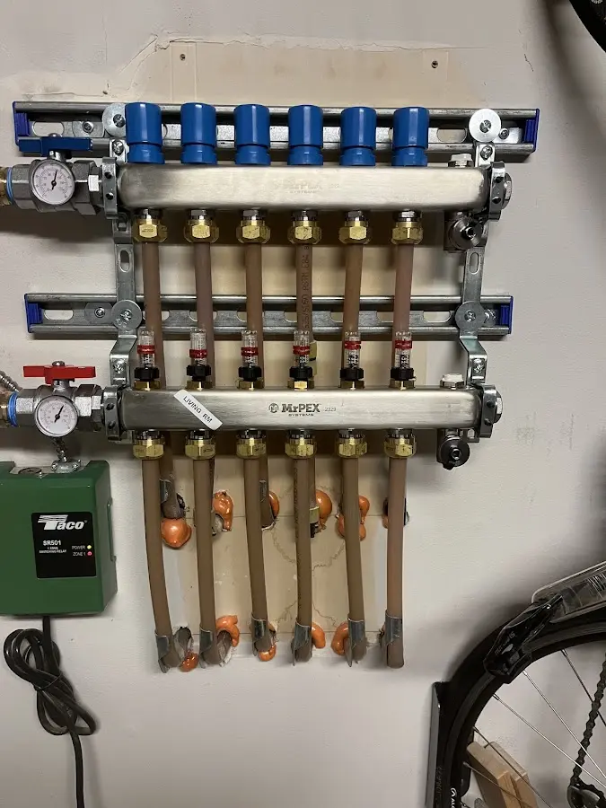 Plumber performing Gas Line Installation at a residential property in The Homesteads